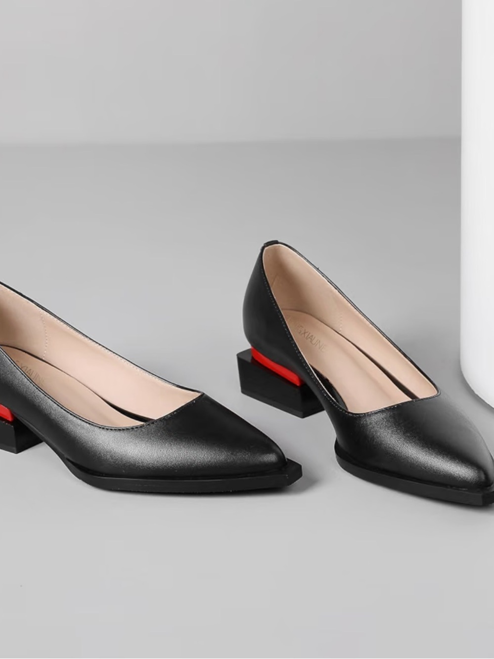 Amazon Black Pointed Flats with Red Heel Accent